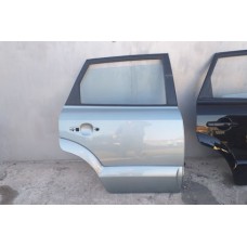  Двері праві задні Hyundai Tucson 104