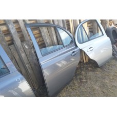 двері задні ліві nissan micra k12 темно сірі 